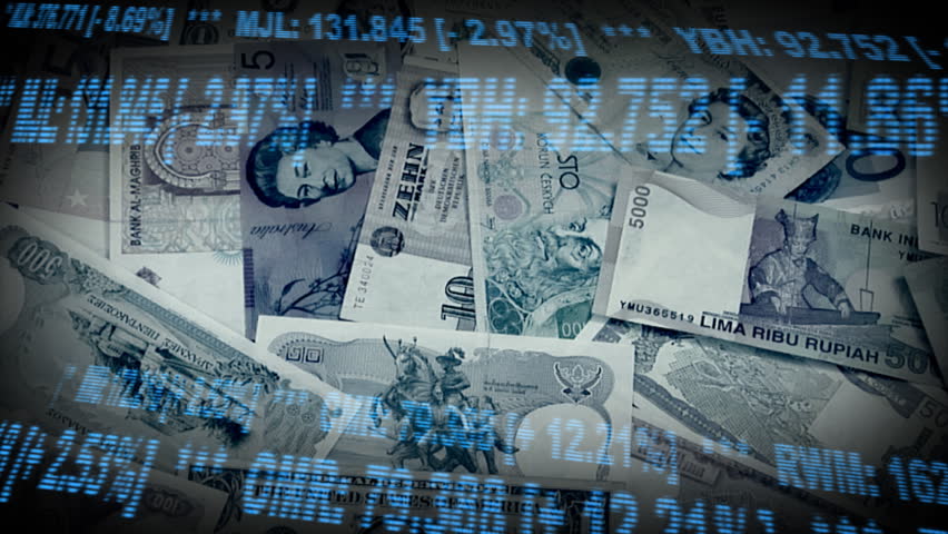 Financial Background: This Montage shows a dolly move over different currencys and rate ribbons.