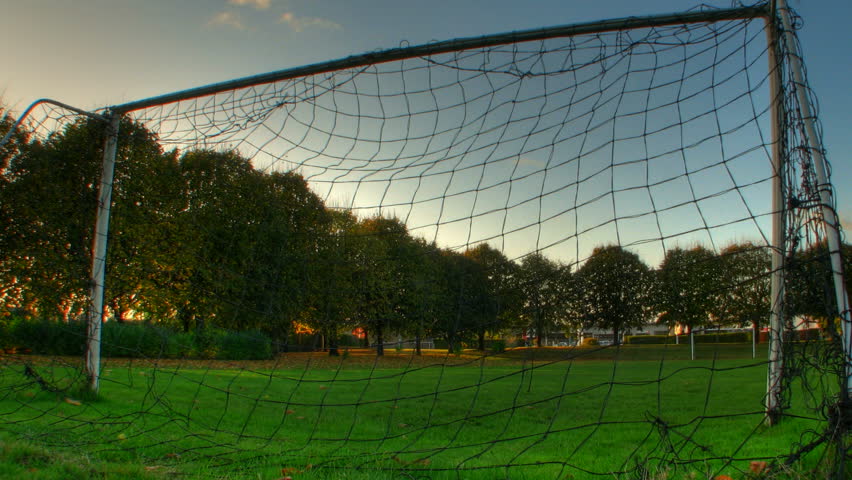 Clouds passing over football goals, HD motion time lapse clip, high dynamic range imaging