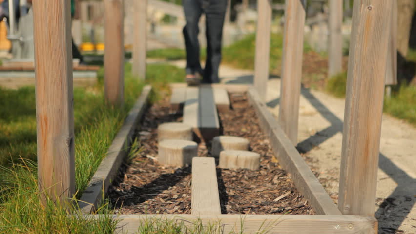 detail legs of senior man balancing 