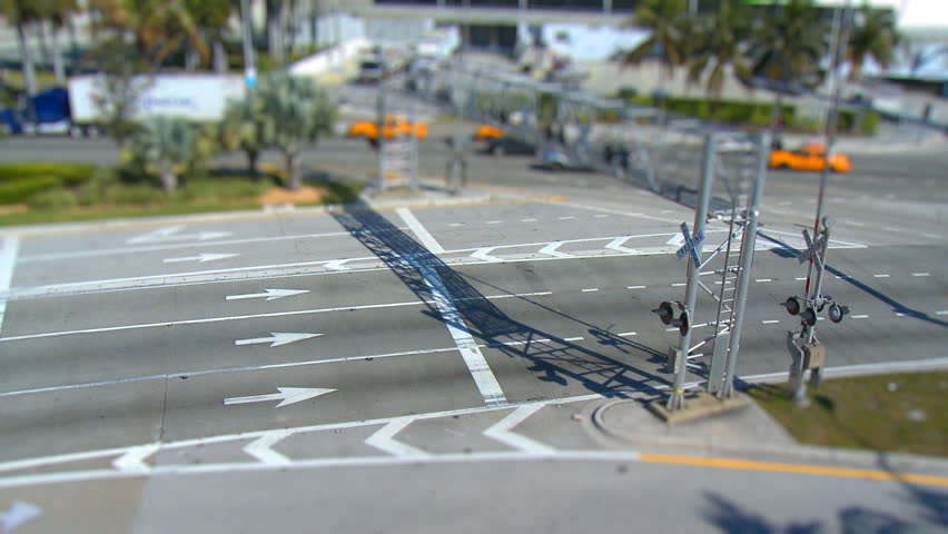 MIAMI - MAR 04: (TILT SHIFT) Busy intersection on March 4th, 2010 in Miami. According to the U.S. Census Bureau, the mean travel time to work for workers age 16 and over is 28 min.