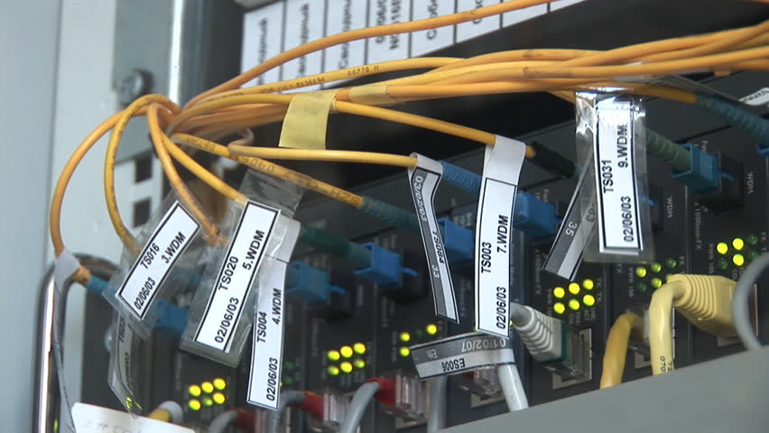media converters connected with fiber optic and ethernet cables panorama down