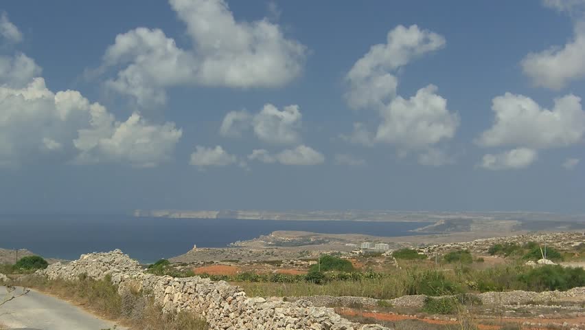 Time lapse coastline of Malta Island with cloudscape