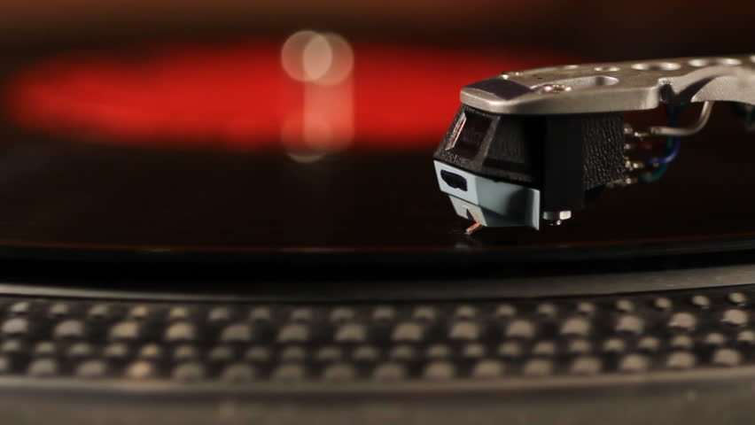 Needle on a spinning record player.