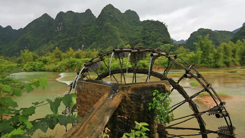 Bamboo water wheel. The use of water power for irrigation. Vietnam