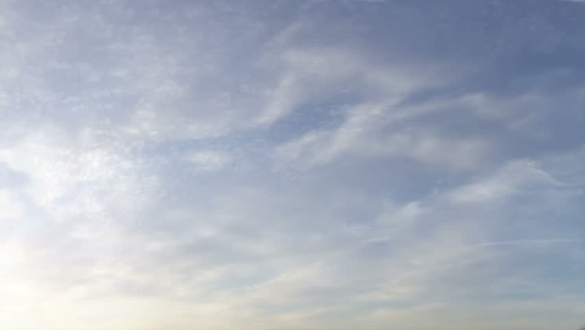Two clips of a flock of pigeons flying slowly across the screen from the left to upper right. The same flock of birds silhouetted against two different skies. Computer generated and HD 1080p