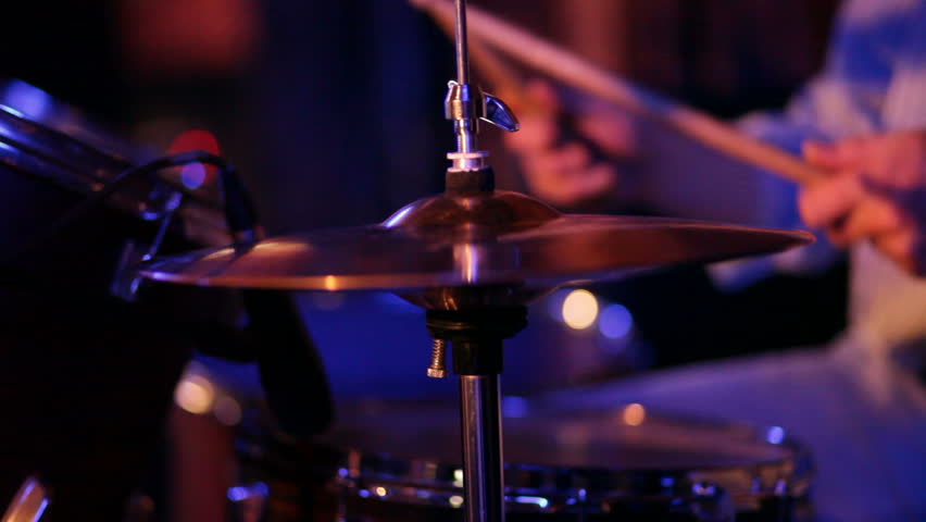 musician plays drums