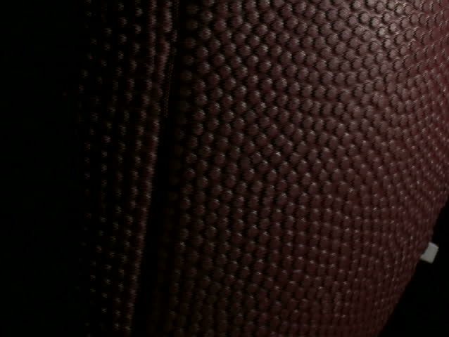 Football isolated on black low angle - NTSC