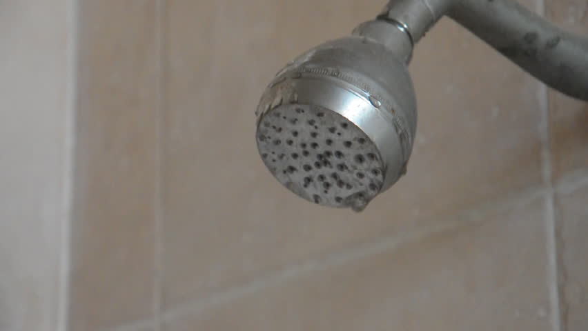 footage of touching of naked electric wire to shower bathroom 