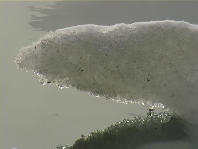 Iceberg droplets melting in water.