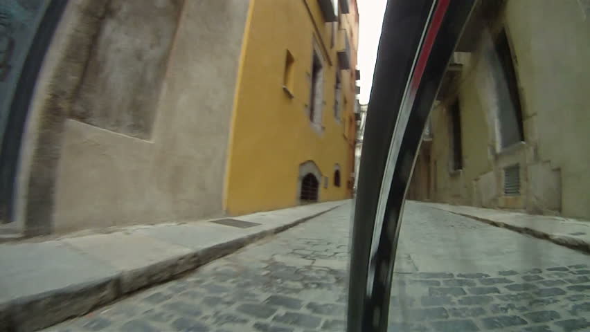 Mountain Bike ride along cobbled street