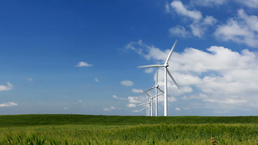 Denmark. Windmill in green field.