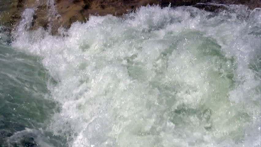 Video closeup of waterfalls and river in Pedernales State Park south Texas. Smooth stone river with rapids and flowing water. Cool, dangerous, boiling water and refreshing. 