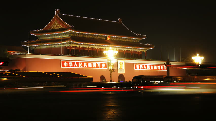 time lapse of city traffic at night, Tienanmen, Beijing, China.