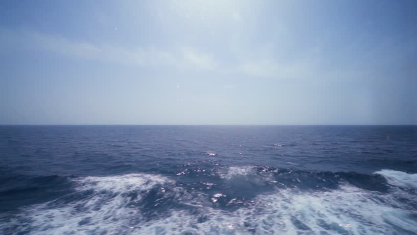 view at blue sea and sky through sidelight of passenger cabin in cruise liner