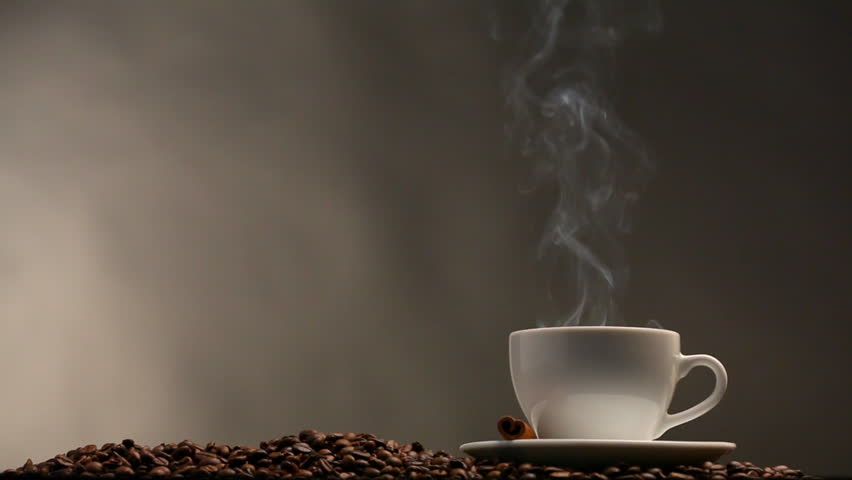 Cup of coffee on black background