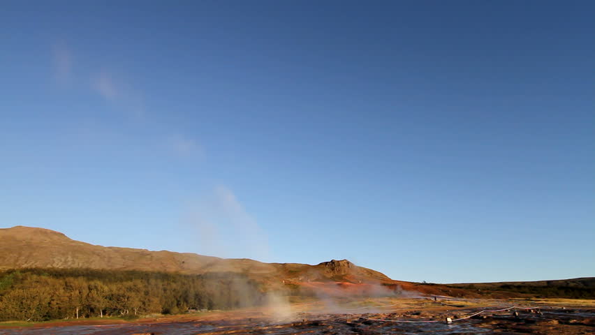 Famous geyser in Iceland called Strokkur erupting. 