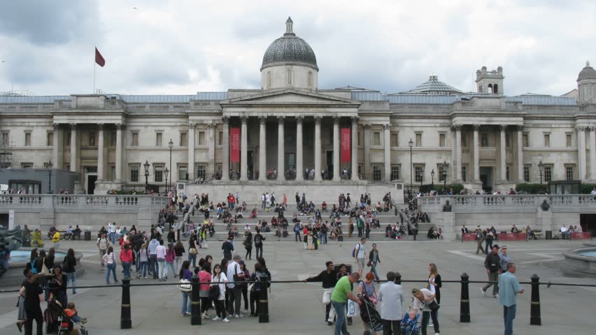 LONDON - JUNE 3: Many tourists walking in Trafalgar Square on June 3, 2010 in London, England. With its position in the heart of London, it is a tourist attraction, and one of the most famous squares in the United Kingdom and the world.