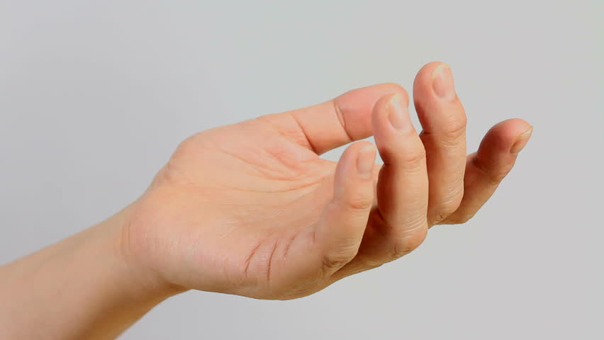 Woman stretches, exercises her hand. 1080p