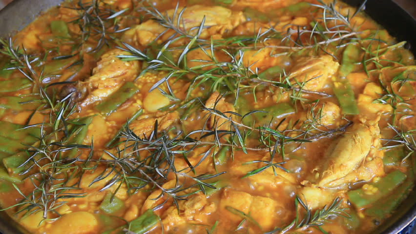 boiling rice for preparing a spanish typical paella
