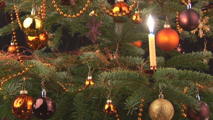 decorated christmastree on black closeup