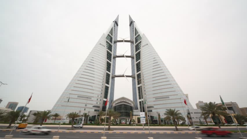 MANAMA - APRIL 16: Bahrain World Trade Center on April 16, 2010 in Manama, Bahrain. The Bahrain World Trade Center is the first skyscraper in the world to integrate wind turbines into its design.