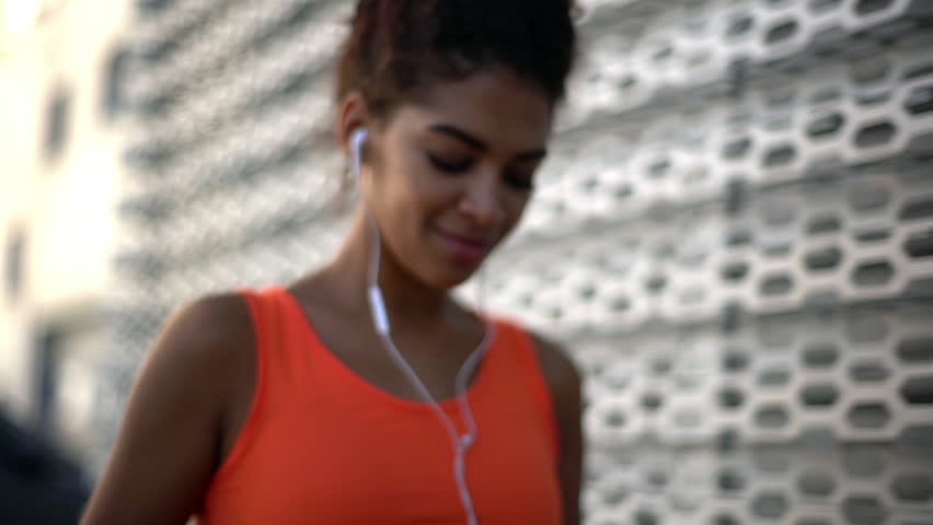 Hd00 16in Slow Motion Beautiful Darkskin Girl With Tied Dark Hair In