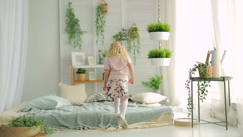 Little Girl Jumping On Bed Stock Footage Video 100 Royalty Free 1008482113 Shutterstock