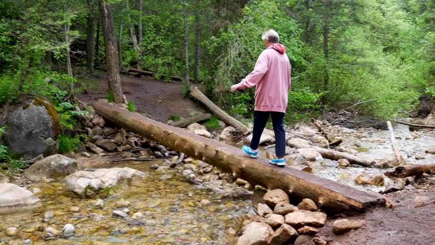 People Hiking across a creek image - Free stock photo - Public Domain ...