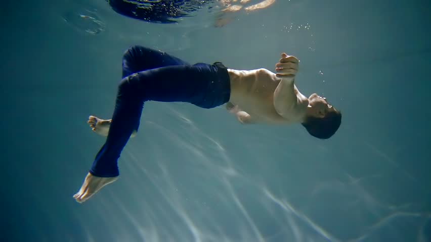 Underwater Person Floating In Water