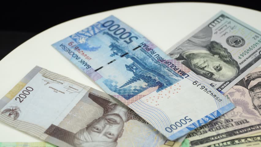 Indonesia Money And Us Dollar Stock Footage Video 100 Royalty Indonesia Money And Us Dollar On White Background 4k