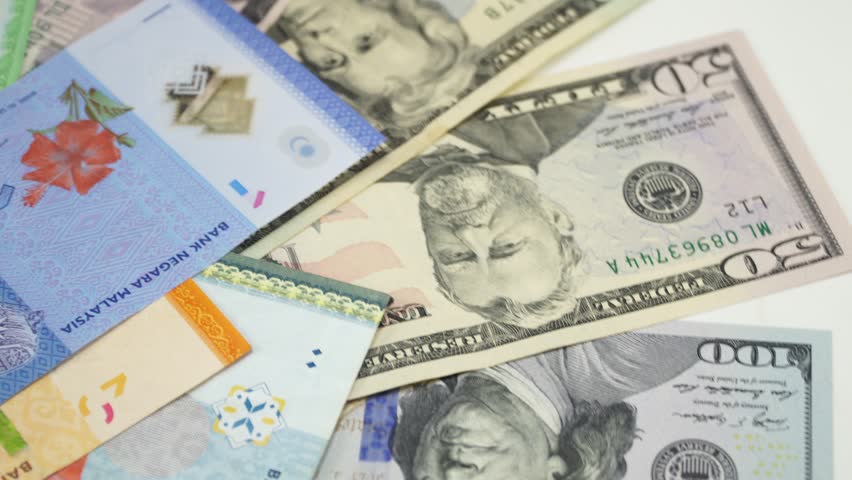 Us Dollar And Malaysia Money Stock Footage Video 100 Royalty Us Dollar And Malaysia Money On The Table Rotating 4k