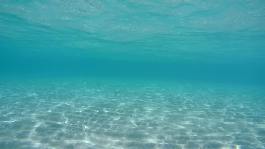 Underwater Shallow Sandy Ocean Floor With Sunlight Through Water ...