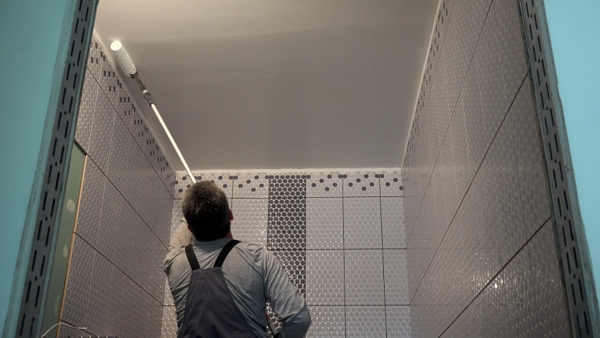Worker Paint Bathroom Ceiling With Stock Footage Video 100