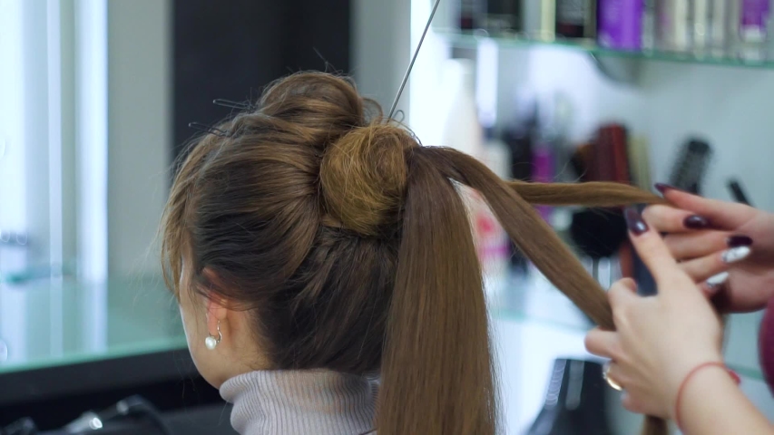 The Hairdresser Forms A Tourniquet Stock Footage Video 100