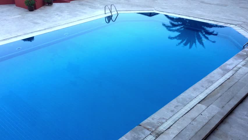 Rectangle Pool Aerial View outside the hotel swimming pool- aerial stock footage video Rectangle Pool Aerial View outside the hotel swimming pool- aerial stock footage video