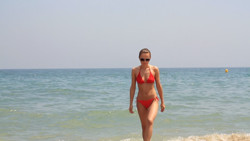 Sexy Girl In Thong Bikini Walking On The Beach Camera Stabilizer Shot