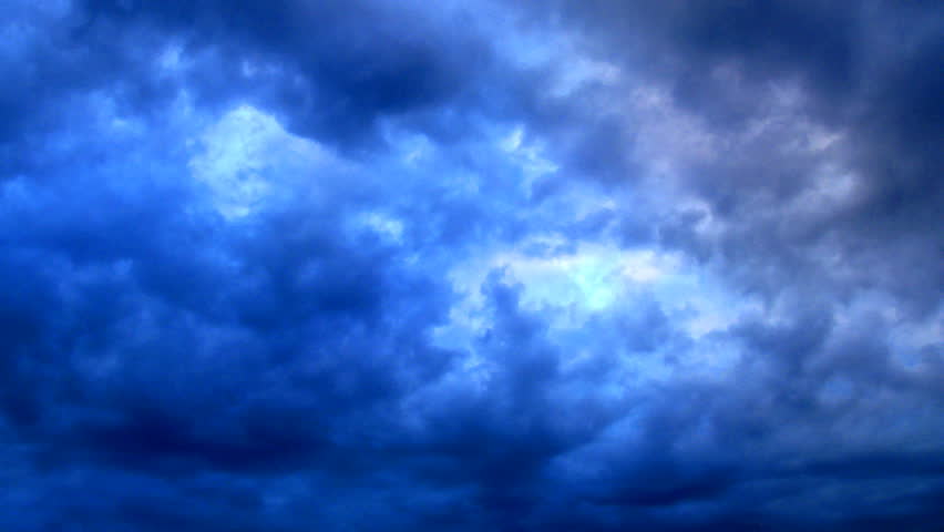 Stock Video Clip Of Blue Skies With Rainy Clouds. 