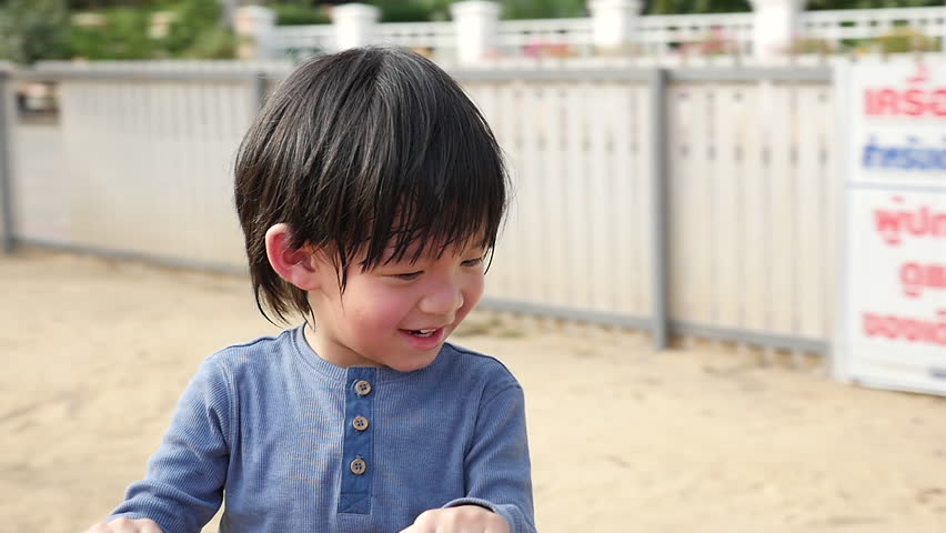 Little Asian Child Having Fun Stock Footage Video 100 Royalty