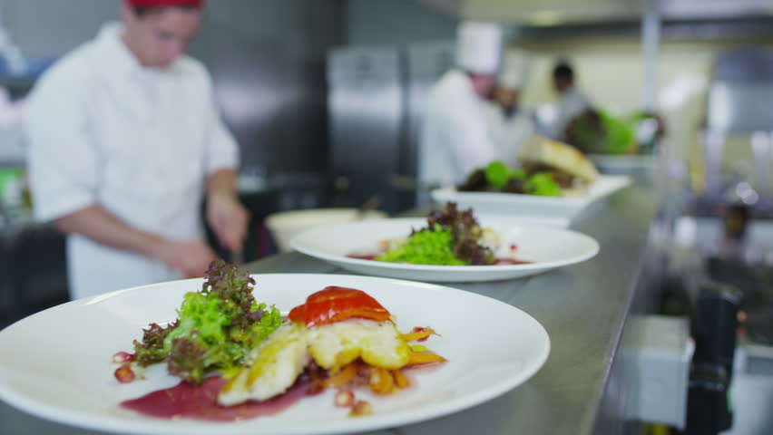 Restaurant Kitchen Video professional chef in a commercial kitchen in a restaurant or hotel Restaurant Kitchen Video professional chef in a commercial kitchen in a restaurant or hotel