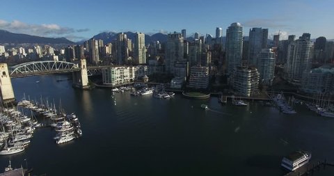 VANCOUVER,CANADA - CIRCA February 2016 :aerial flight towards burrard bridge downtown skyline