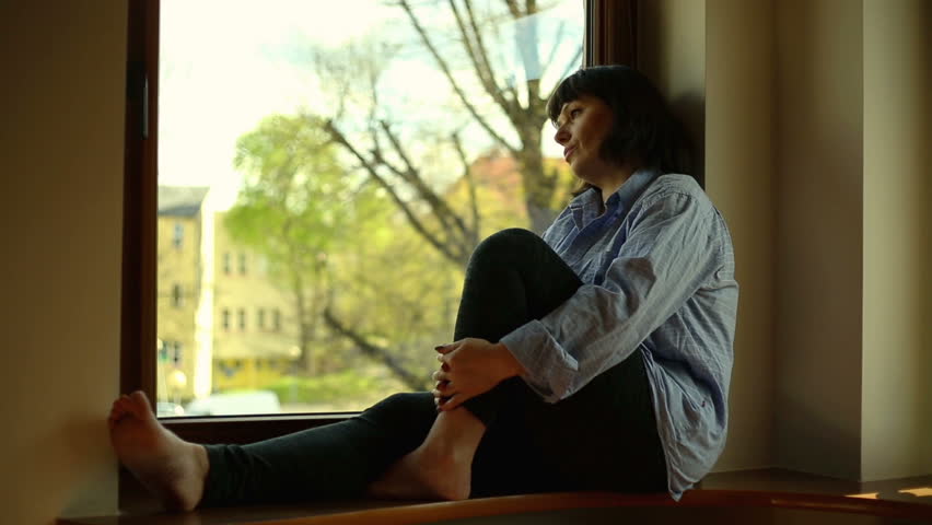 Sad Woman Sitting Near Window Stock Footage Video 100 Royaltyfree