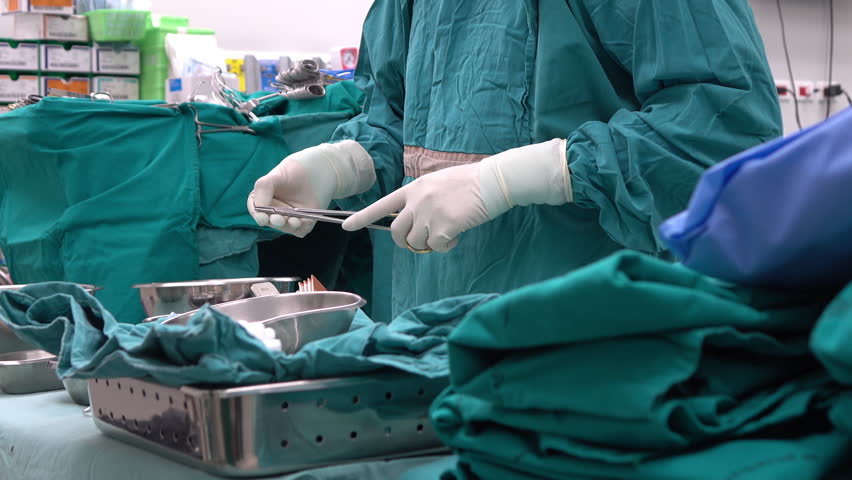 Asian Scrub Nurse Preparing Surgical Stock Footage Video 100 Royalty Free 16826983 Shutterstock