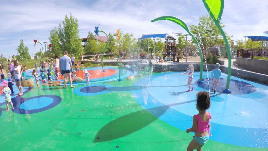 Guy Is Jumping Into Pool Man Smiling At Camera Splash Slow Denver Colorado Usa June 3 2016 Splash Park Playground In Urban