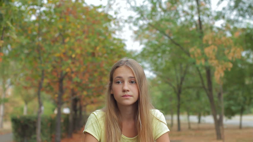 Confused Sad Teen Girl Outdoors Stock Footage Video 100 Royalty Free 17179153 Shutterstock