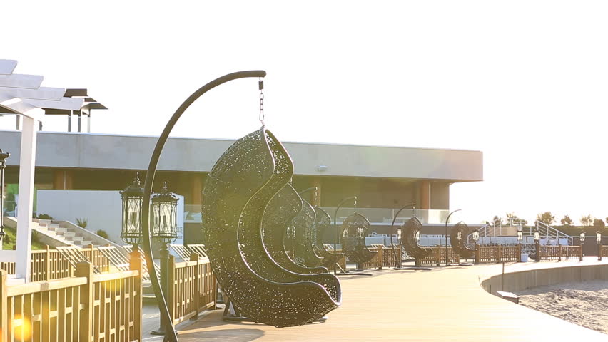Modern Furniture Video round modern furniture plastic wicker chairs in garden. aqua park Modern Furniture Video round modern furniture plastic wicker chairs in garden. aqua park