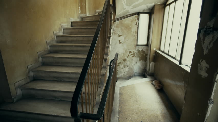 Apartment Building Inside floor entrance of an old ghetto apartment building.tracking shot Apartment Building Inside floor entrance of an old ghetto apartment building.tracking shot
