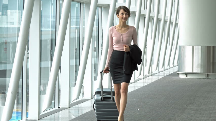 Sexy Woman Walking At The Airport Photo