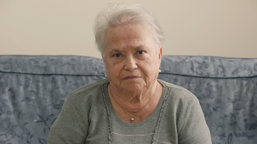 Stock Video Clip Of Portrait Of Old Depressed Woman Sit On