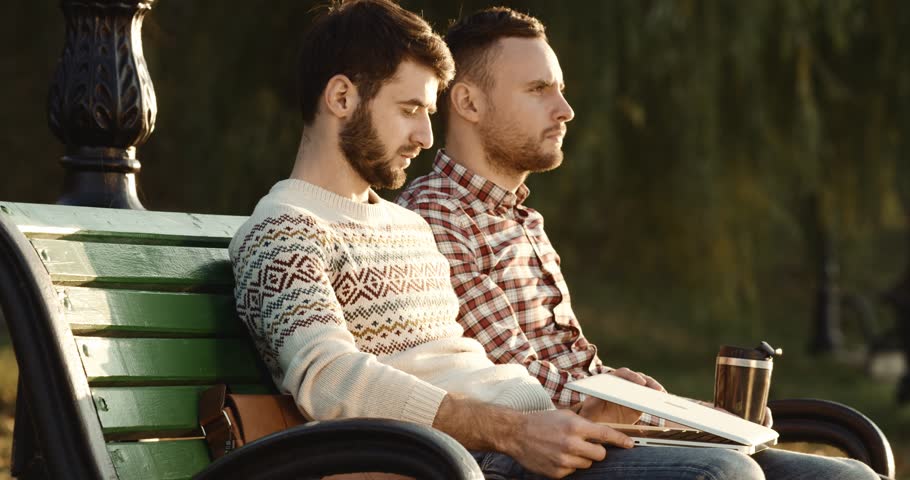 Image result for two guys talking on street