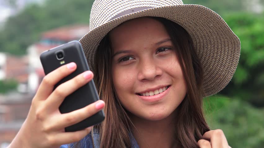 Adorable Teen Girl Making Selfies And Funny Faces Adorable Teen Girl Making Selfies And Funny Faces